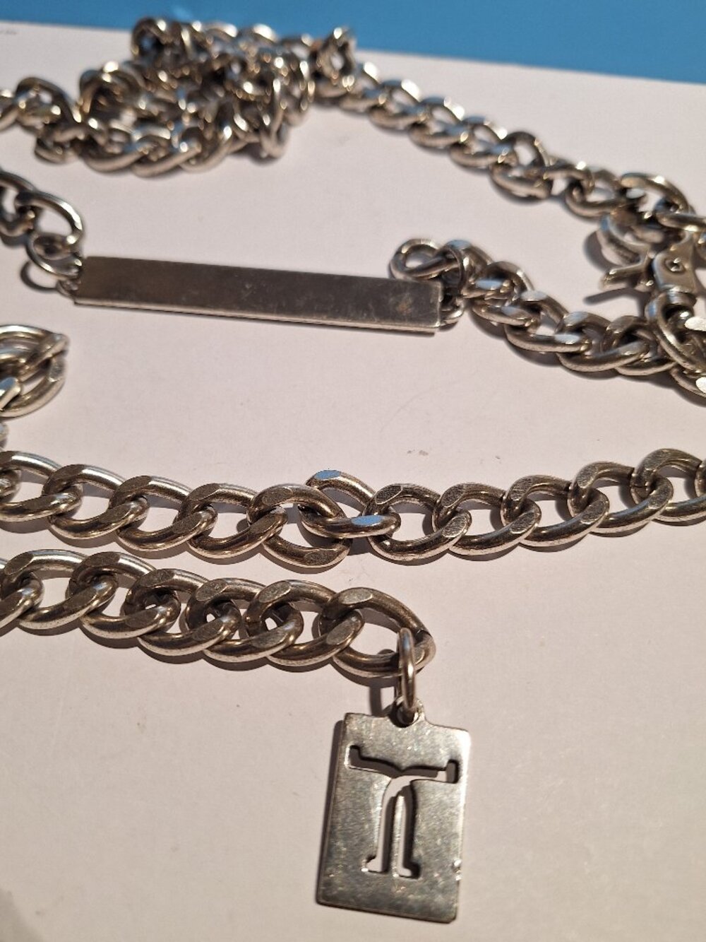Tristin Chain Belt with a Metal Bar Pendant.